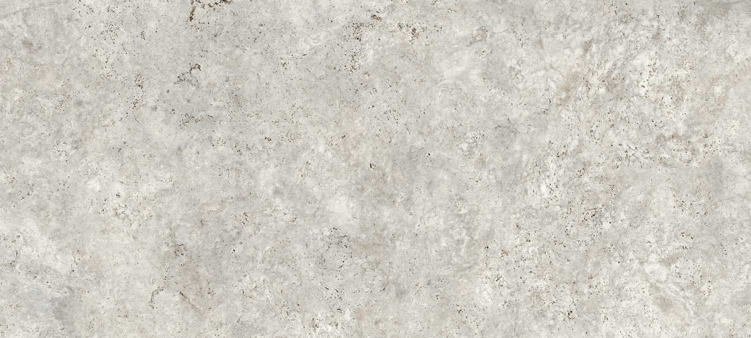 Dekton Sabbia porcelain for kitchen countertops, also great for shower walls, in a light taupe textured finish. Porcelain by Granite Guy Inc.