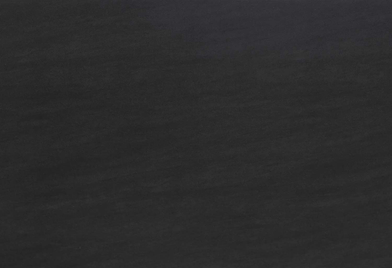 Neolith Basalt Black countertops with a deep matte finish, great for kitchen countertops or shower walls. Neolith porcelain by Granite Guy Inc.