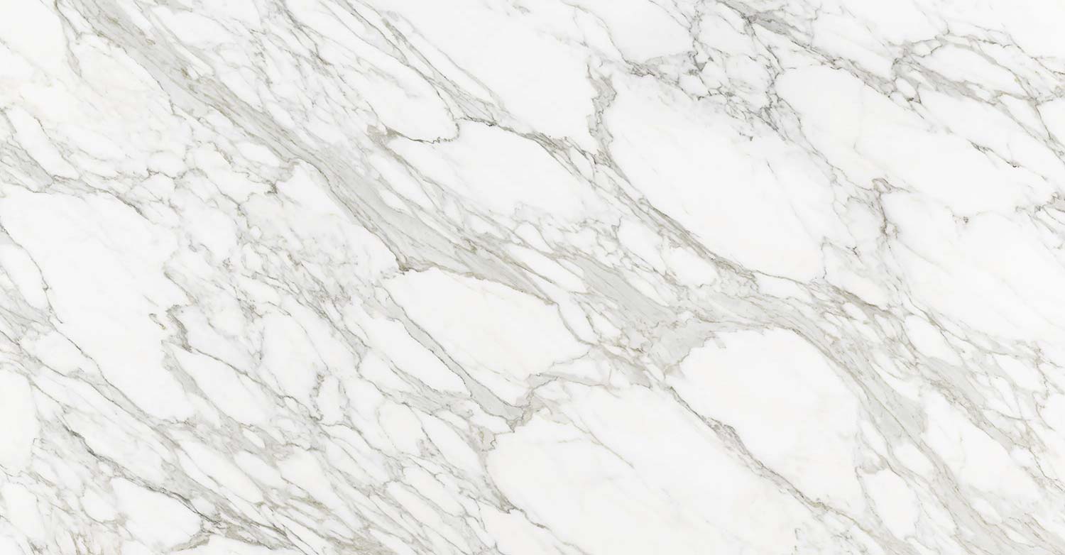 Neolith Calacatta Royale countertops with bold marble veining, perfect for kitchen countertops or shower walls. Neolith porcelain by Granite Guy Inc.