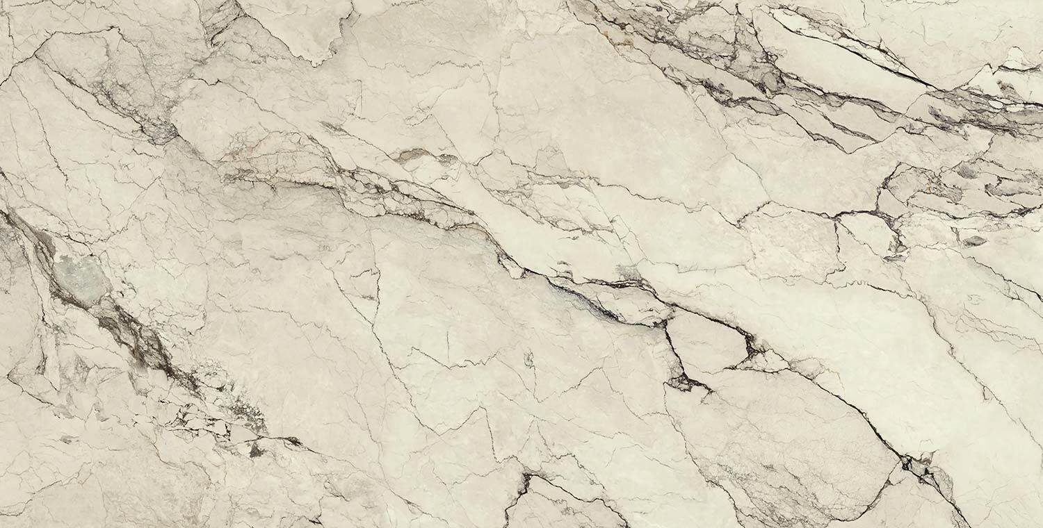 Neolith Colorado Dunes countertops with bold dark veining over a warm beige tone, great for kitchen countertops. Neolith porcelain by Granite Guy Inc.