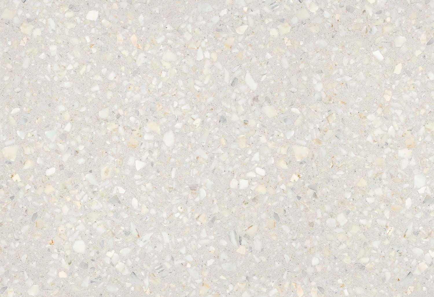 Neolith Retrostone porcelain kitchen countertops with light terrazzo pattern and stone fragments. Neolith porcelain by Granite Guy Inc.