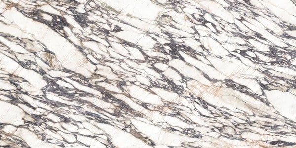 SapienStone Fior di Viola 4D porcelain kitchen countertops with dramatic purple-gray veining on a warm white base by Granite Guy Inc.