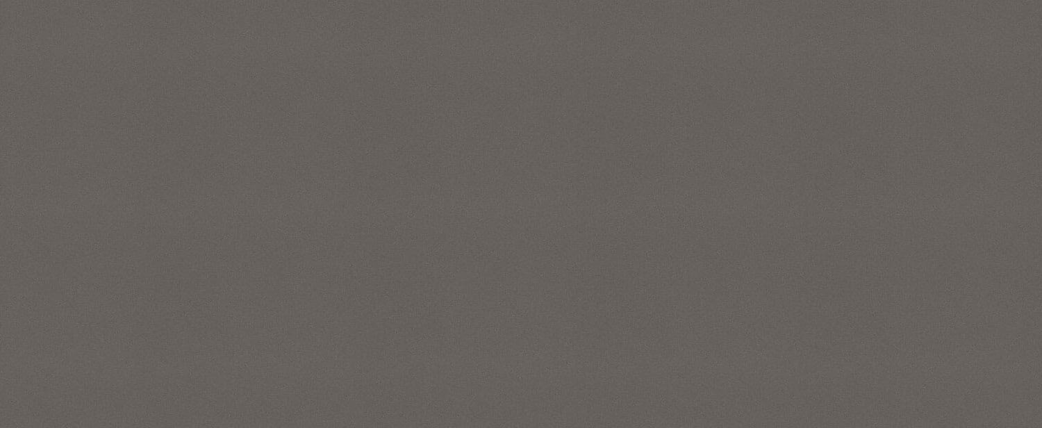 Caesarstone Quartz 2003 Concrete countertops in a sleek, dark tone, perfect for kitchen countertops. Caesarstone quartz by Granite Guy Inc.