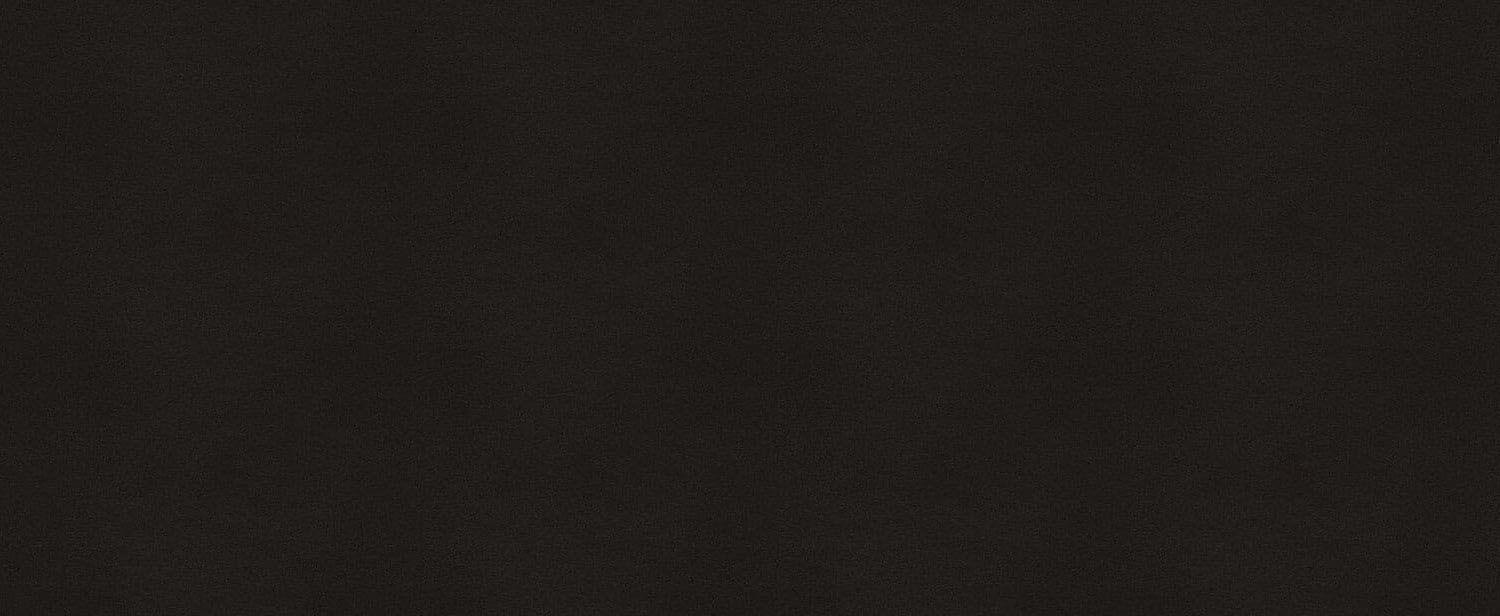 Caesarstone Quartz 3100 Jet Black countertops in a deep, dramatic black tone, perfect for kitchen countertops. Caesarstone quartz by Granite Guy Inc.