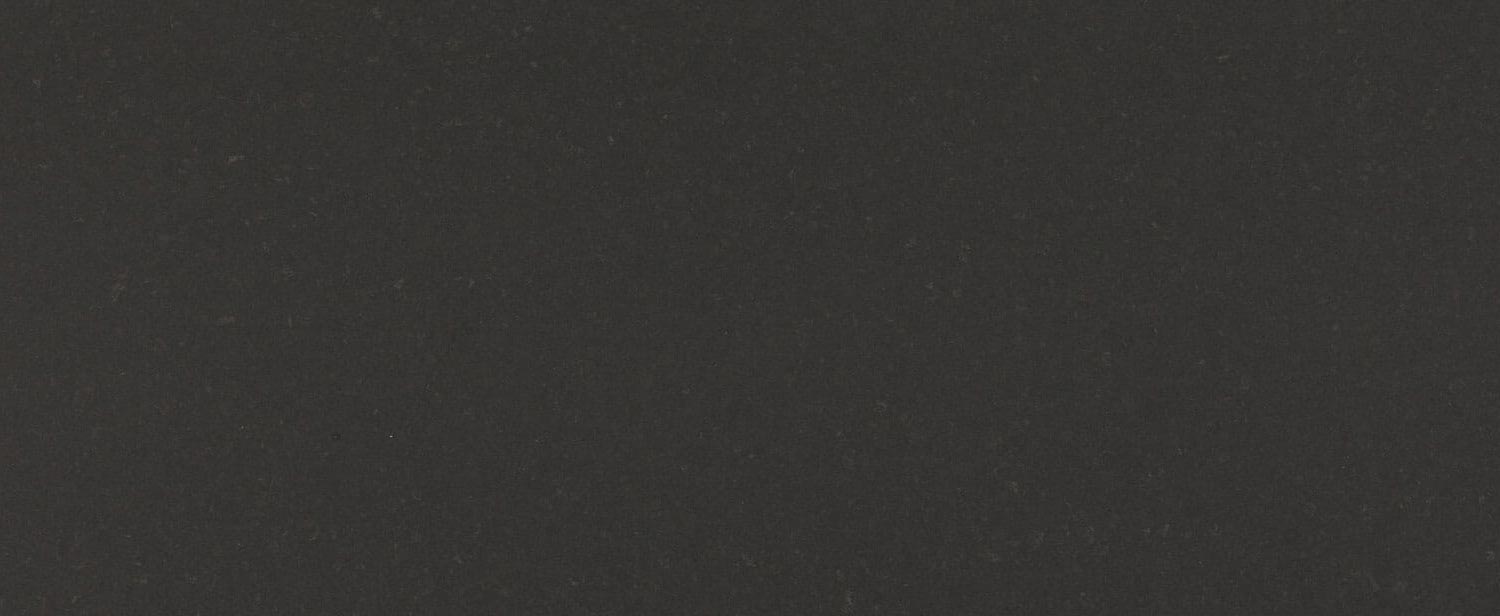 Caesarstone Quartz 4120 Raven countertops in a deep black tone, perfect for kitchen countertops. Caesarstone quartz by Granite Guy Inc.