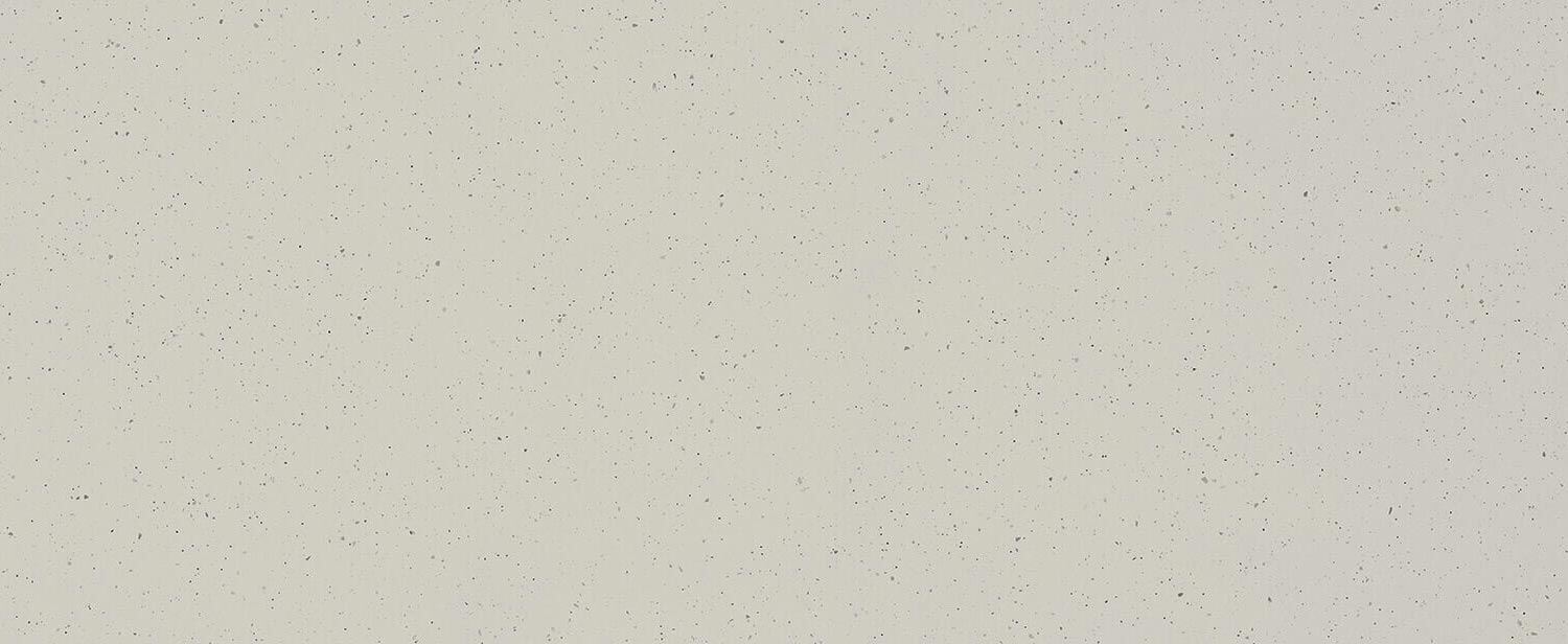 Caesarstone Quartz 4601 Frozen Terra countertops in a soft, light gray tone with subtle specks, perfect for kitchen countertops. Caesarstone quartz by Granite Guy Inc.