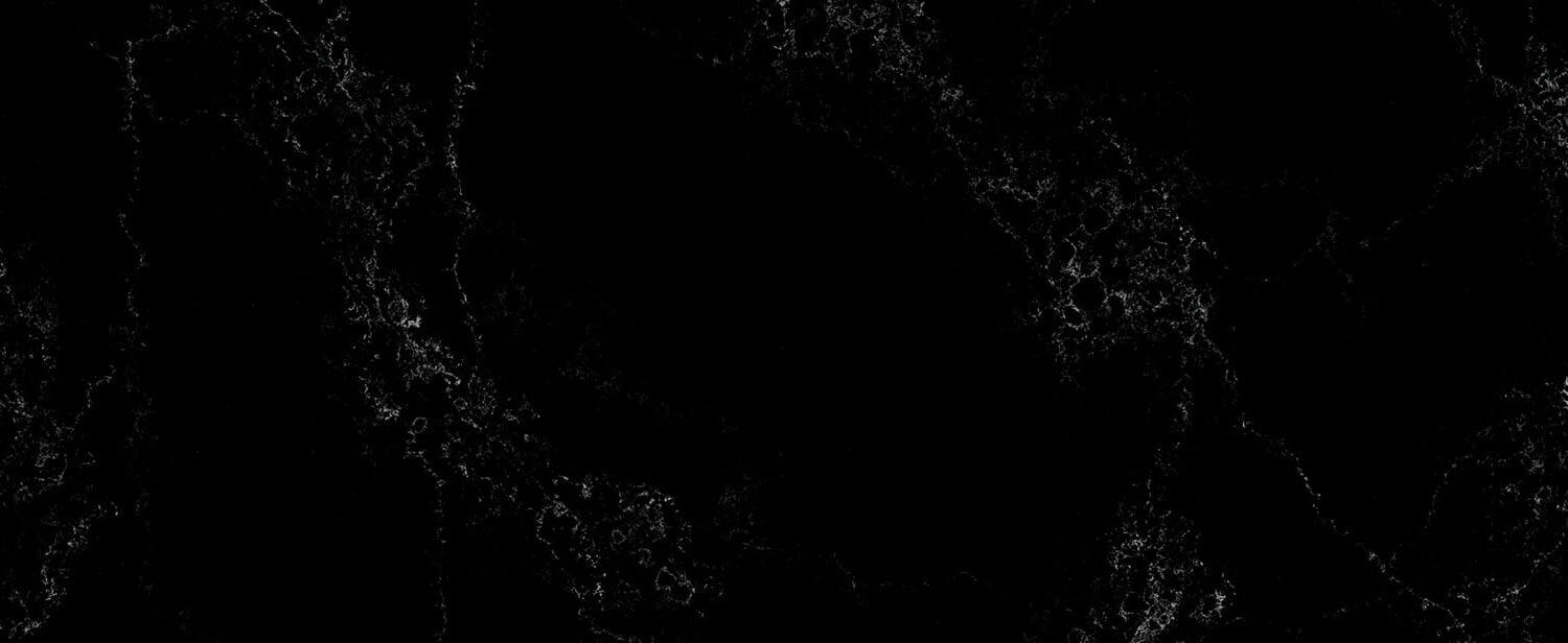 Caesarstone Quartz 5101 Empira Black countertops in deep black with striking white veining, perfect for kitchen countertops. Caesarstone quartz by Granite Guy Inc.