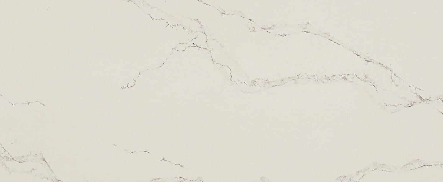 Caesarstone Quartz 5111 Statuario Nuvo countertops in creamy white with soft grey patterns, ideal for kitchen countertops. Caesarstone quartz by Granite Guy Inc.