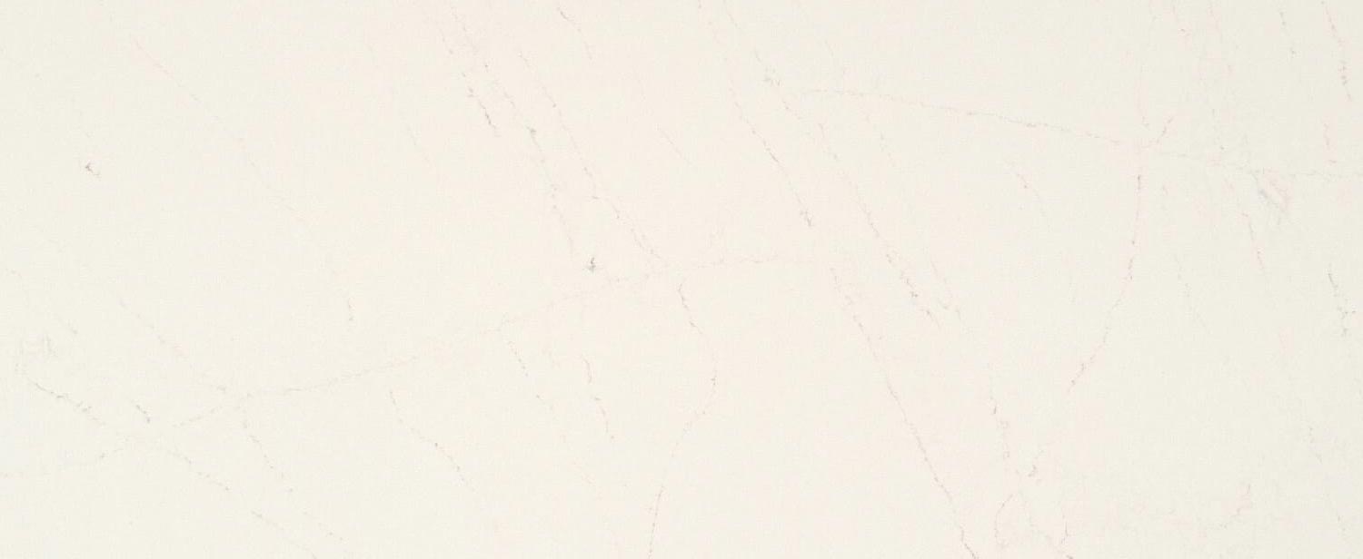 Caesarstone Quartz 5112 Aterra Blanca countertops in creamy white with subtle grey patterns, ideal for kitchen countertops. Caesarstone quartz by Granite Guy Inc.