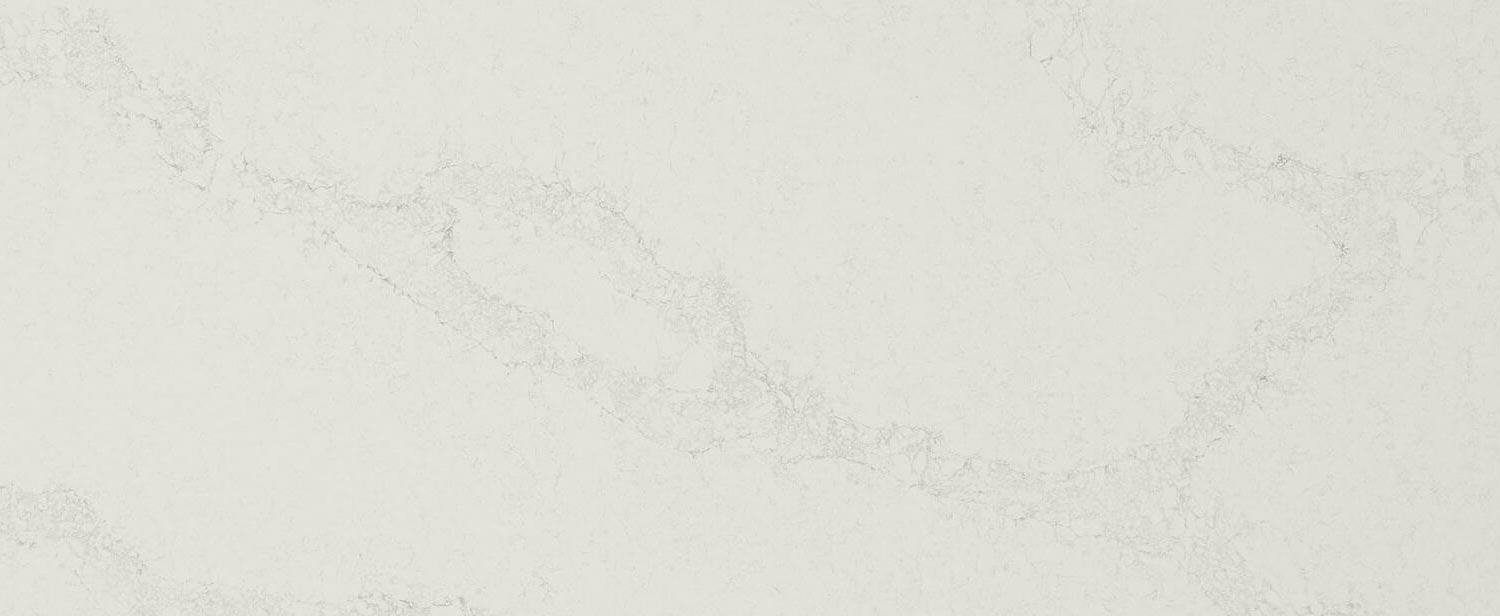 Caesarstone Quartz 5122 Aterra Verity countertops in soft white with warm linear patterns, ideal for kitchen countertops. Caesarstone quartz by Granite Guy Inc.