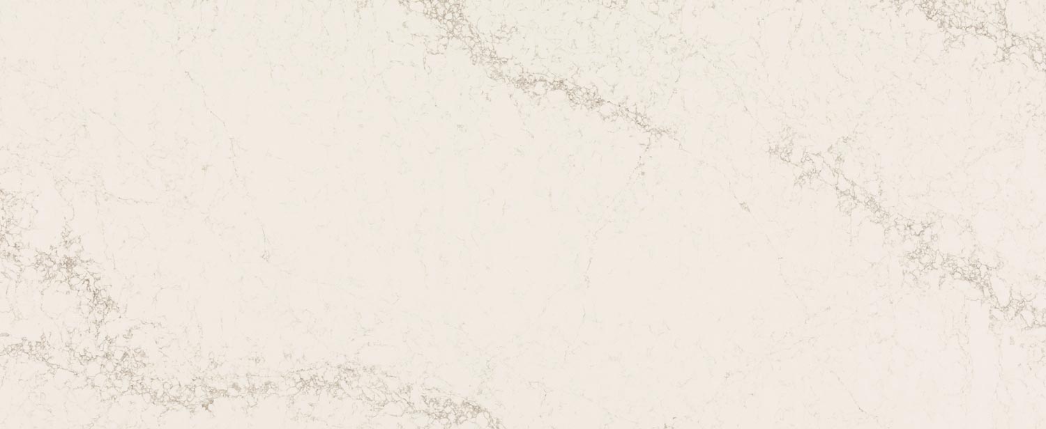 Caesarstone Quartz 5132 Celestial Sky countertops in off-white with soft cloud-like patterning, ideal for kitchen countertops. Caesarstone quartz by Granite Guy Inc.