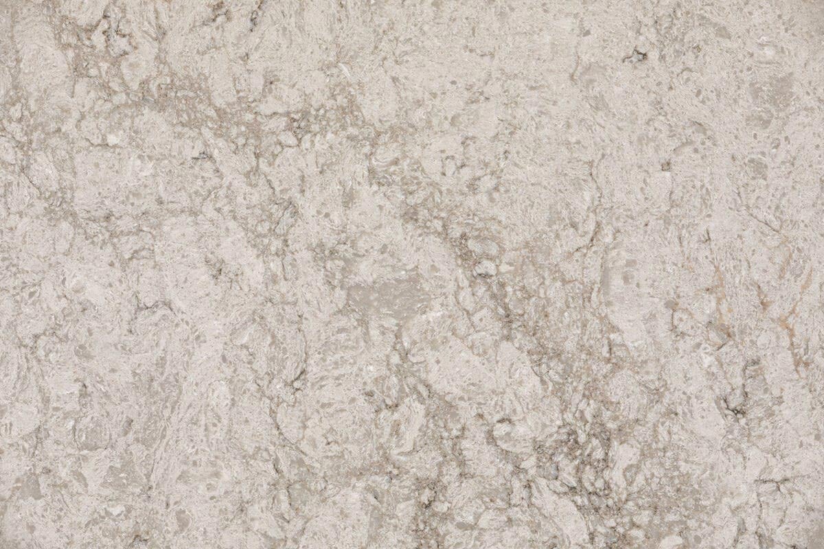 Caesarstone Quartz 6046 Moorland Fog countertops with a textured beige and grey pattern, perfect for kitchen countertops. Caesarstone quartz by Granite Guy Inc.
