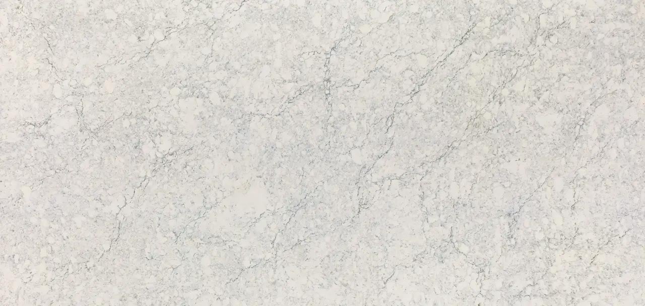 Cambria Quartz Avalene countertops with white tones and delicate gray veining, perfect for kitchen countertops by Granite Guy Inc.
