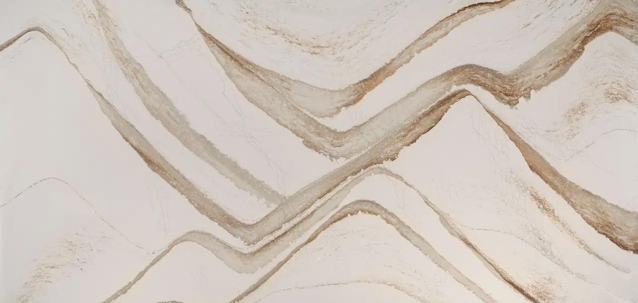 Cambria Quartz Brittanicca Gold Warm countertops with bold gold veining on white, perfect for kitchen countertops by Granite Guy Inc.