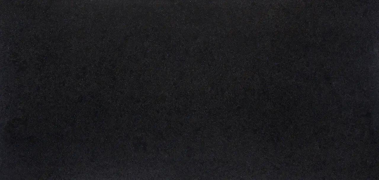 Cambria Quartz Charston countertops with deep black tone and subtle shimmer, perfect for kitchen countertops by Granite Guy Inc.