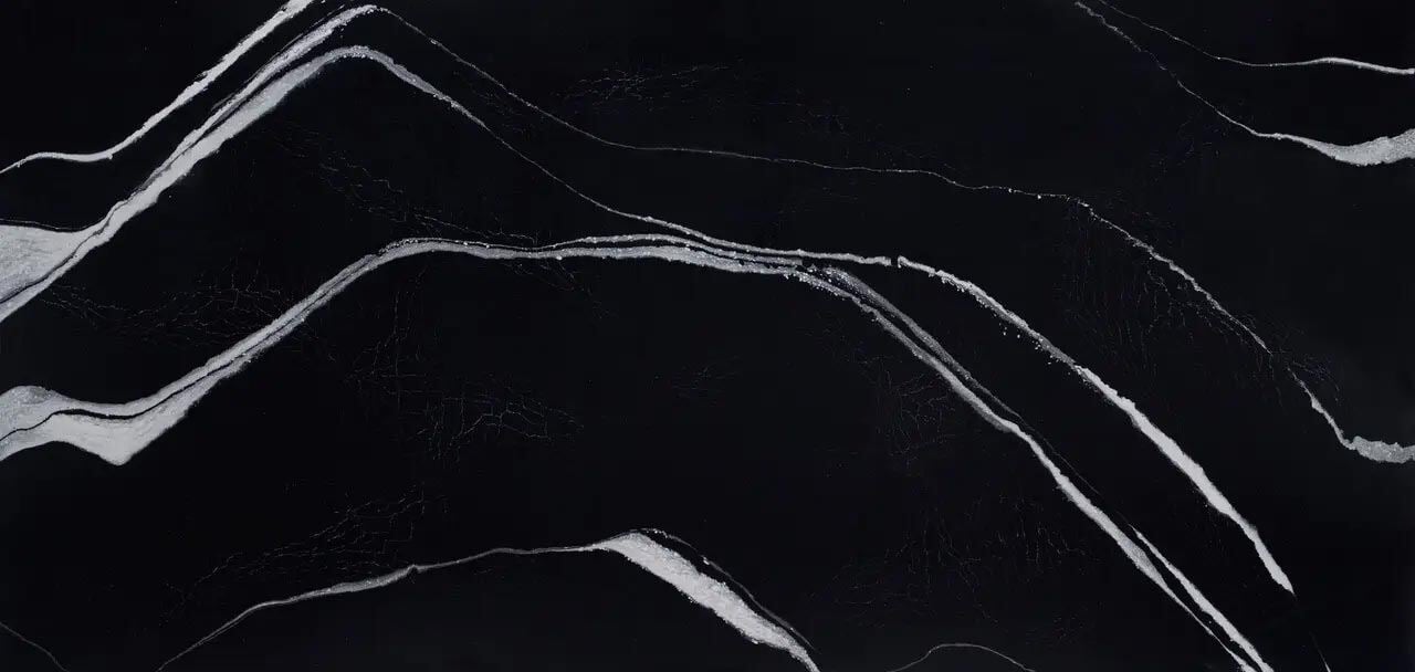 Cambria Quartz Mersey countertops with white veining on rich black base, perfect for kitchen countertops by Granite Guy Inc.