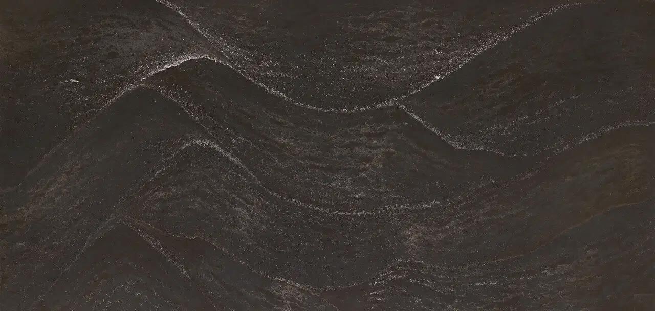 Cambria Quartz Remington Steel countertops with black waves and metallic shimmer, perfect for kitchen countertops by Granite Guy Inc.