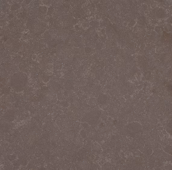 One Quartz Columbus Brown countertops in a rich brown tone with subtle speckling, ideal for kitchen countertops. One Quartz by Granite Guy Inc.