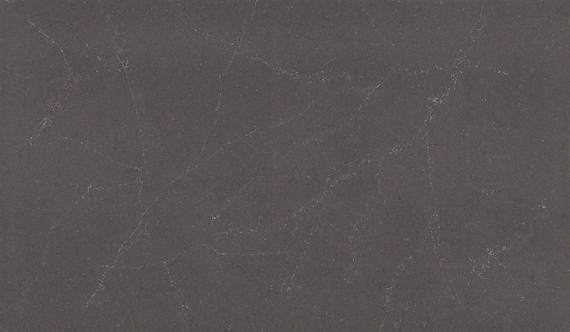 One Quartz Sirius countertops in a deep charcoal tone with faint veining, perfect for kitchen countertops. One Quartz by Granite Guy Inc.