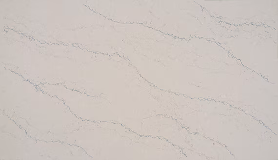 One Quartz Washington countertops in a soft white base with gentle taupe patterning, ideal for kitchen countertops. One Quartz by Granite Guy Inc.