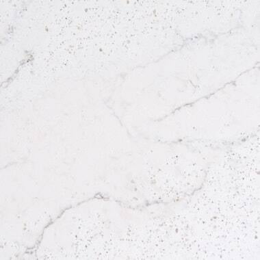 Silestone Quartz Eclectic Pearl countertops with creamy white base and soft speckled veining, ideal for kitchen countertops. Silestone quartz by Granite Guy Inc.