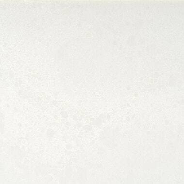 Silestone Quartz Nolita countertops in a soft white tone with faint concrete texture, ideal for kitchen countertops. Silestone quartz by Granite Guy Inc.