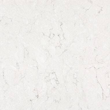 Silestone Quartz Snowy Ibiza countertops with soft grey veining on a clean white base, perfect for kitchen countertops. Silestone quartz by Granite Guy Inc.
