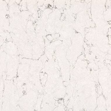 Silestone Quartz White Arabesque countertops with soft grey veining on a creamy white base, ideal for kitchen countertops. Silestone quartz by Granite Guy Inc.