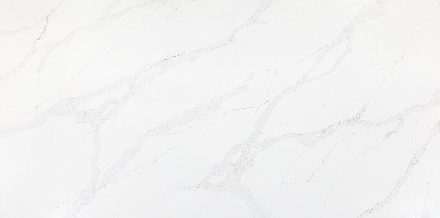 Vadara Quartz Amaranta countertops with soft white base and light gray patterns, ideal for kitchen countertops. Vadara quartz by Granite Guy Inc.
