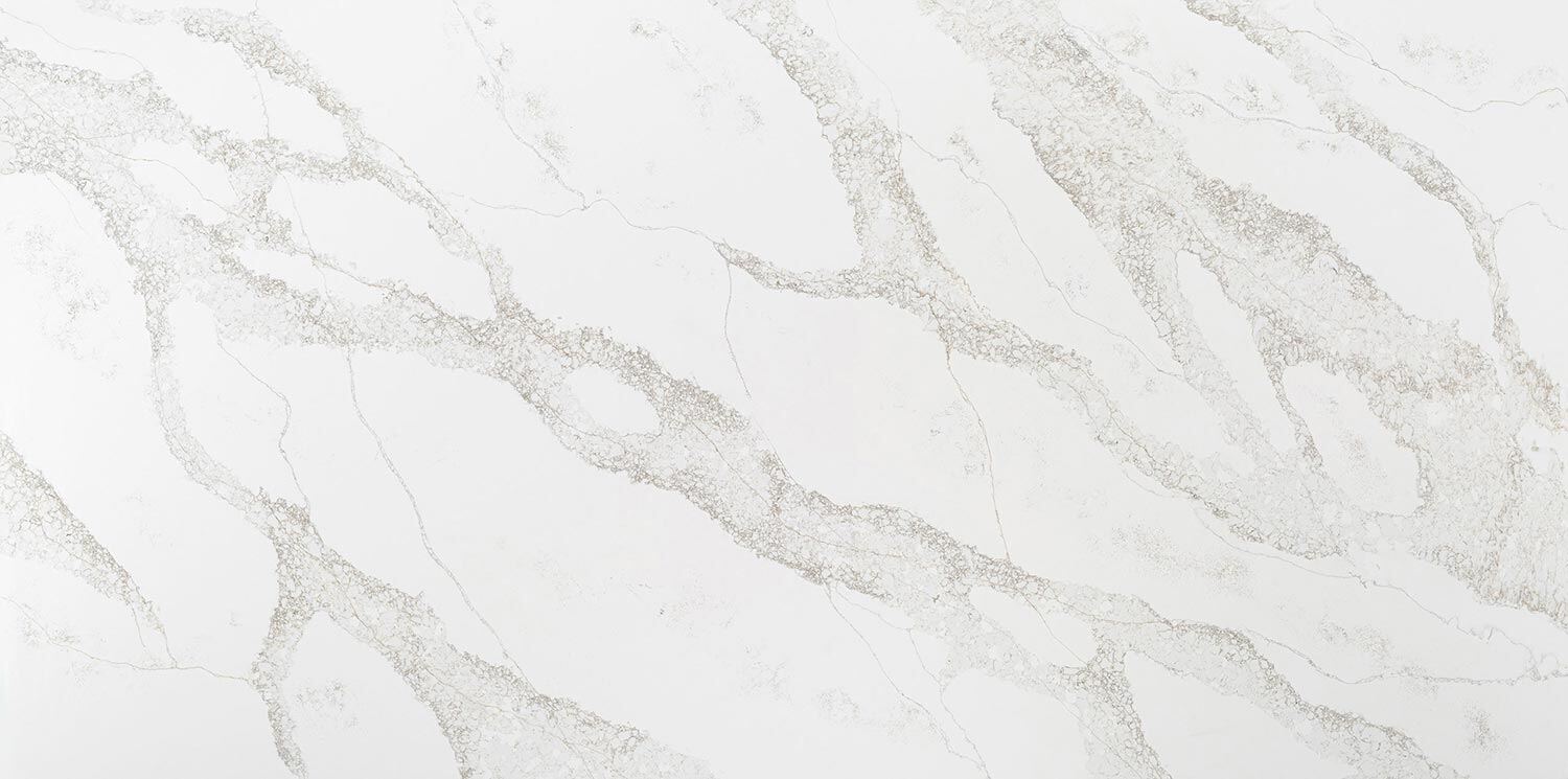 Vadara Quartz Moonlit Lace countertops featuring delicate gray patterns, ideal for kitchen countertops. Vadara quartz by Granite Guy Inc.