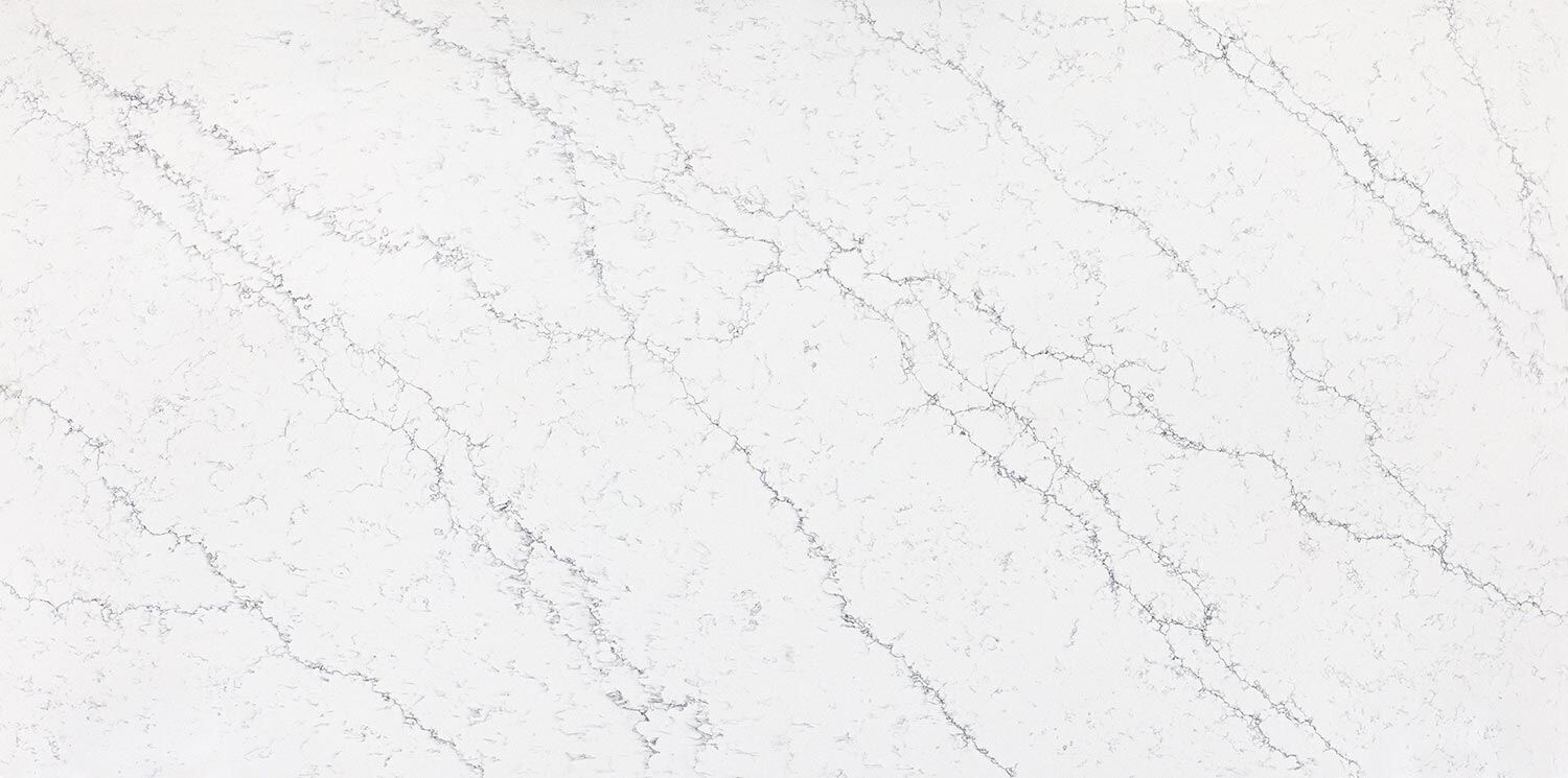 Vadara Quartz Naurelle Grey countertops with soft grey veining, ideal for kitchen countertops. Vadara quartz by Granite Guy Inc