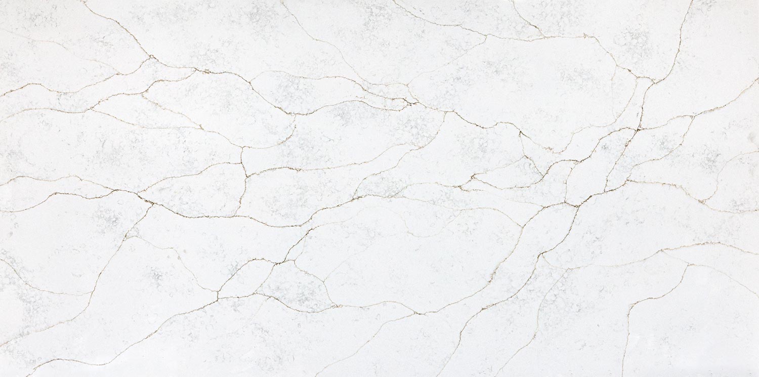 Vadara Quartz Ostara Dawn countertops with soft taupe veining, great for kitchen countertops. Vadara quartz by Granite Guy Inc.