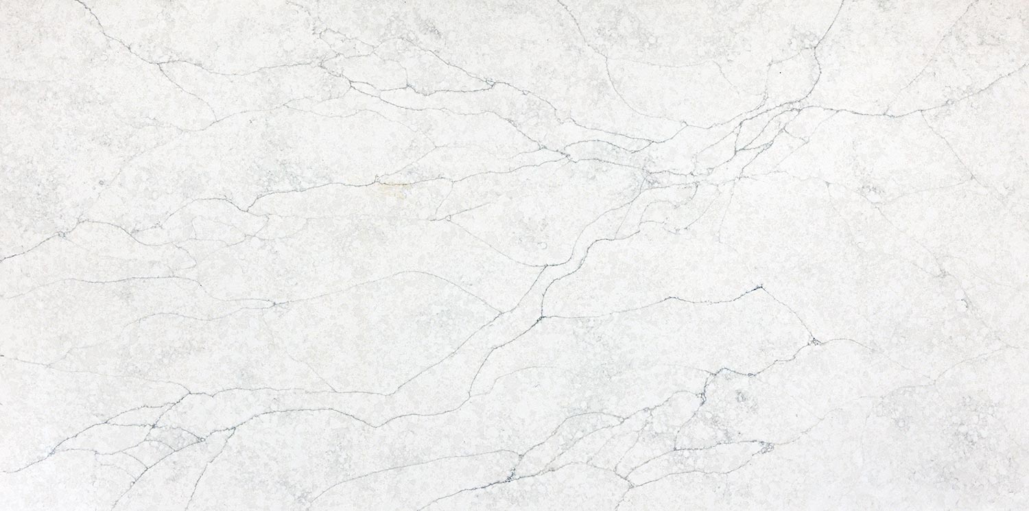 Vadara Quartz Sereno Bianco countertops with soft gray patterning, perfect for kitchen countertops. Vadara quartz by Granite Guy Inc.