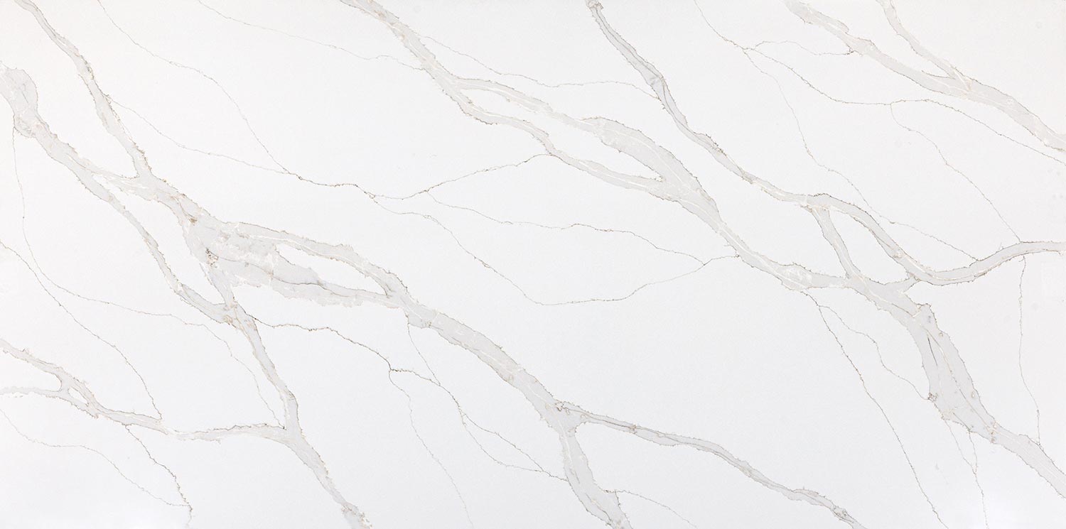Vadara Quartz Sunrise Vista countertops with soft beige and gray veining, perfect for kitchen countertops. Vadara quartz by Granite Guy Inc.