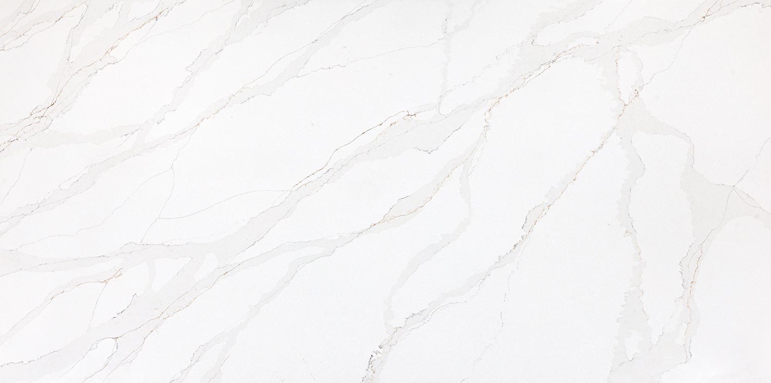 Vadara Quartz White Aurora countertops with subtle light gray veining, ideal for kitchen countertops. Vadara quartz by Granite Guy Inc.