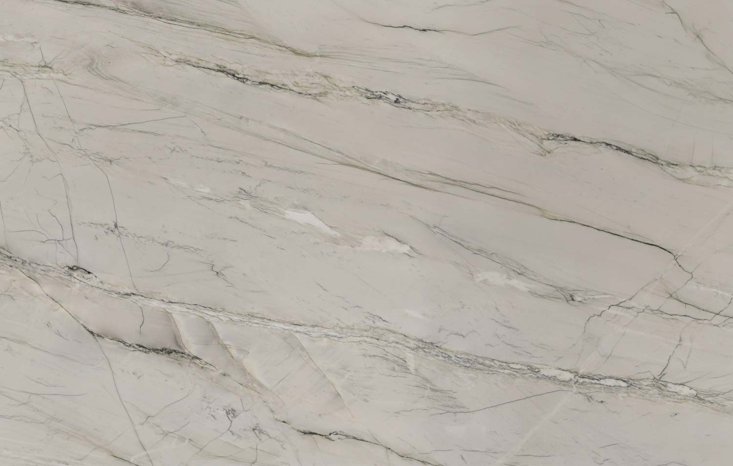 Swiss Alps quartzite countertops with a soft white base and subtle gray veins, perfect for kitchen countertops by Granite Guy Inc.