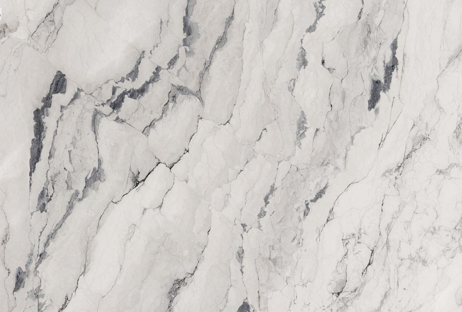 Aegean Pearl quartzite countertops with a white base and striking gray veining, perfect for elegant kitchen countertops by Granite Guy Inc.