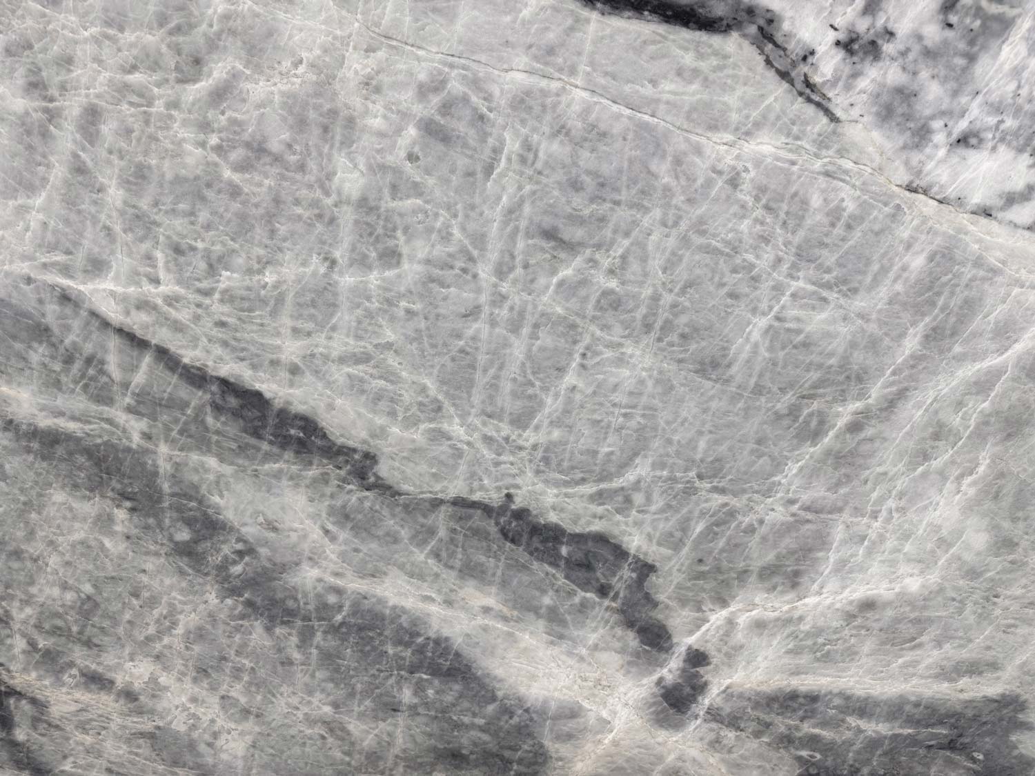 Angeli Sky quartzite countertops with soft gray and white veining, perfect for kitchen countertops by Granite Guy Inc.