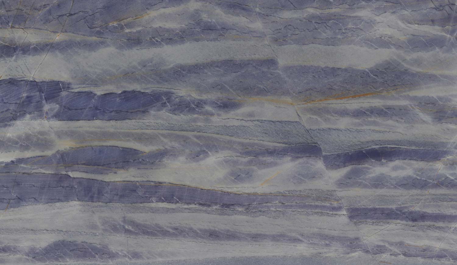 Azul Macaubas quartzite kitchen countertops with striking blue and gray patterns, ideal for kitchens, bathrooms, and fireplaces. Granite Guy Inc.