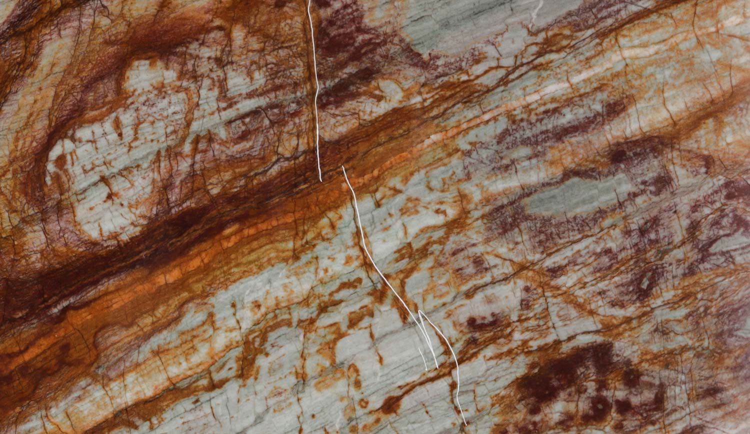 Blue Luiza quartzite countertops with striking blue, rust, and gold veining, perfect for kitchen countertops by Granite Guy Inc.