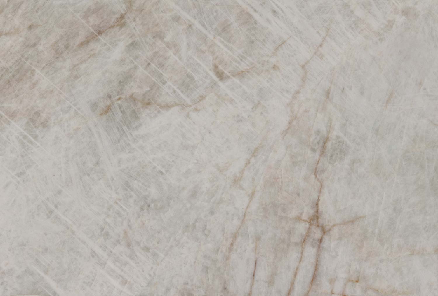 Cristalo quartzite countertops with soft white tones and delicate veining, ideal for kitchen countertops and vanities by Granite Guy Inc.