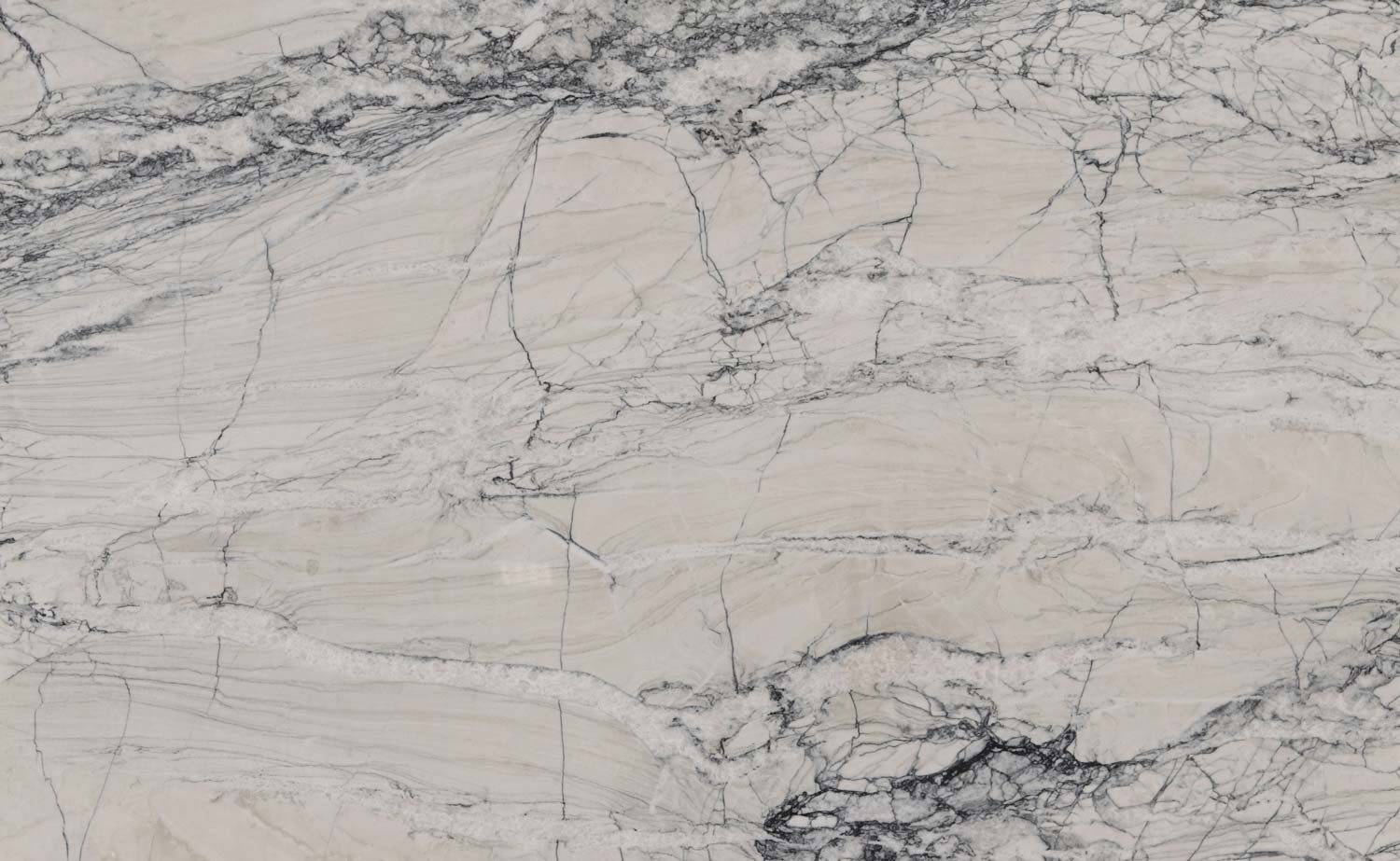 Fantasy Lux quartzite countertops featuring intricate dark veining on a light background, perfect for luxury kitchen countertops by Granite Guy Inc.