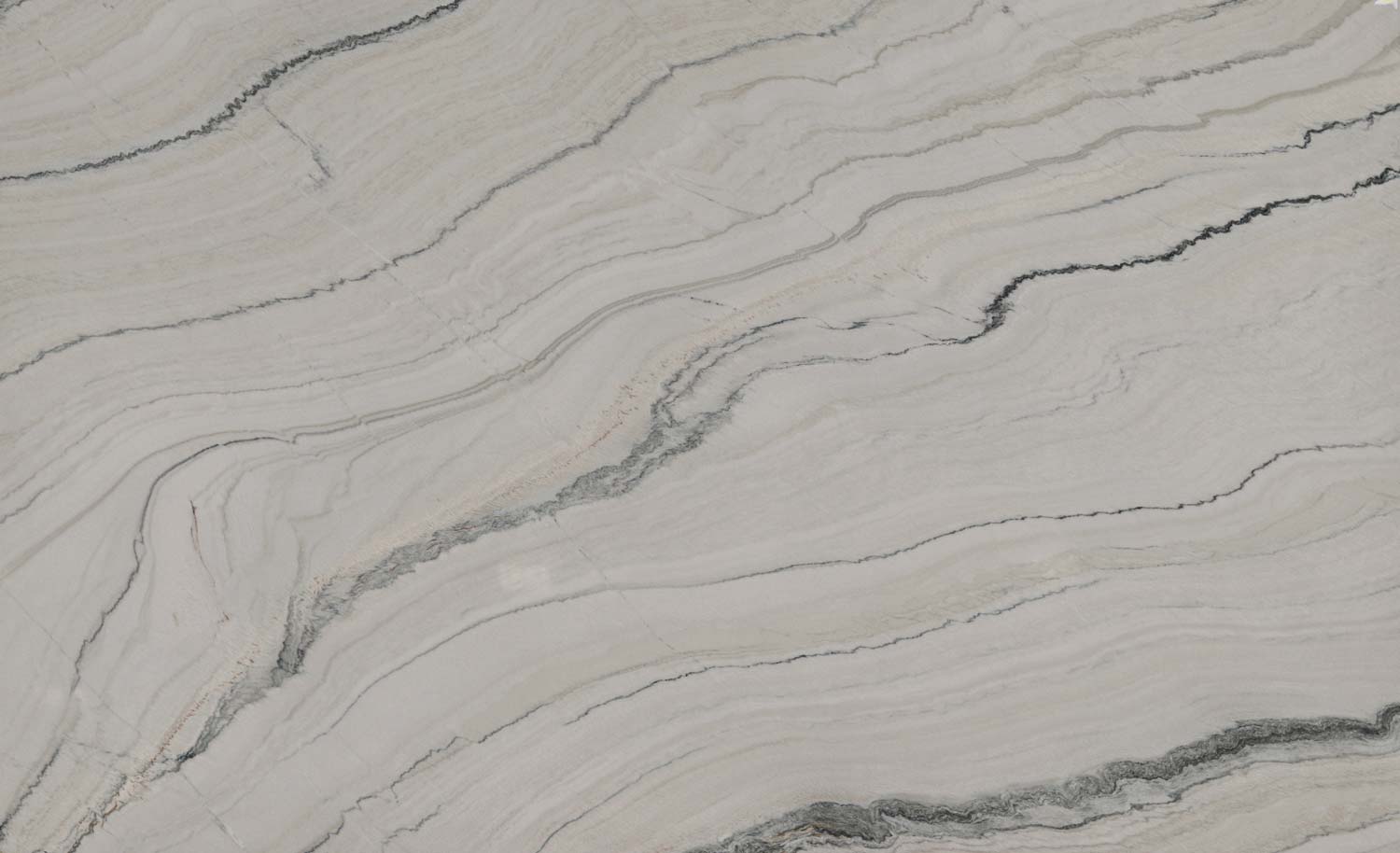 Fantasy Macaubas quartzite countertops with flowing gray and black veining on white, perfect for kitchen countertops by Granite Guy Inc.