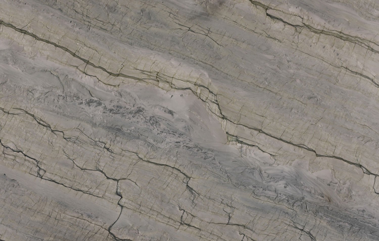 Infinity Blue quartzite countertops with striking blue-gray patterns, ideal for kitchen countertops and statement islands by Granite Guy Inc.