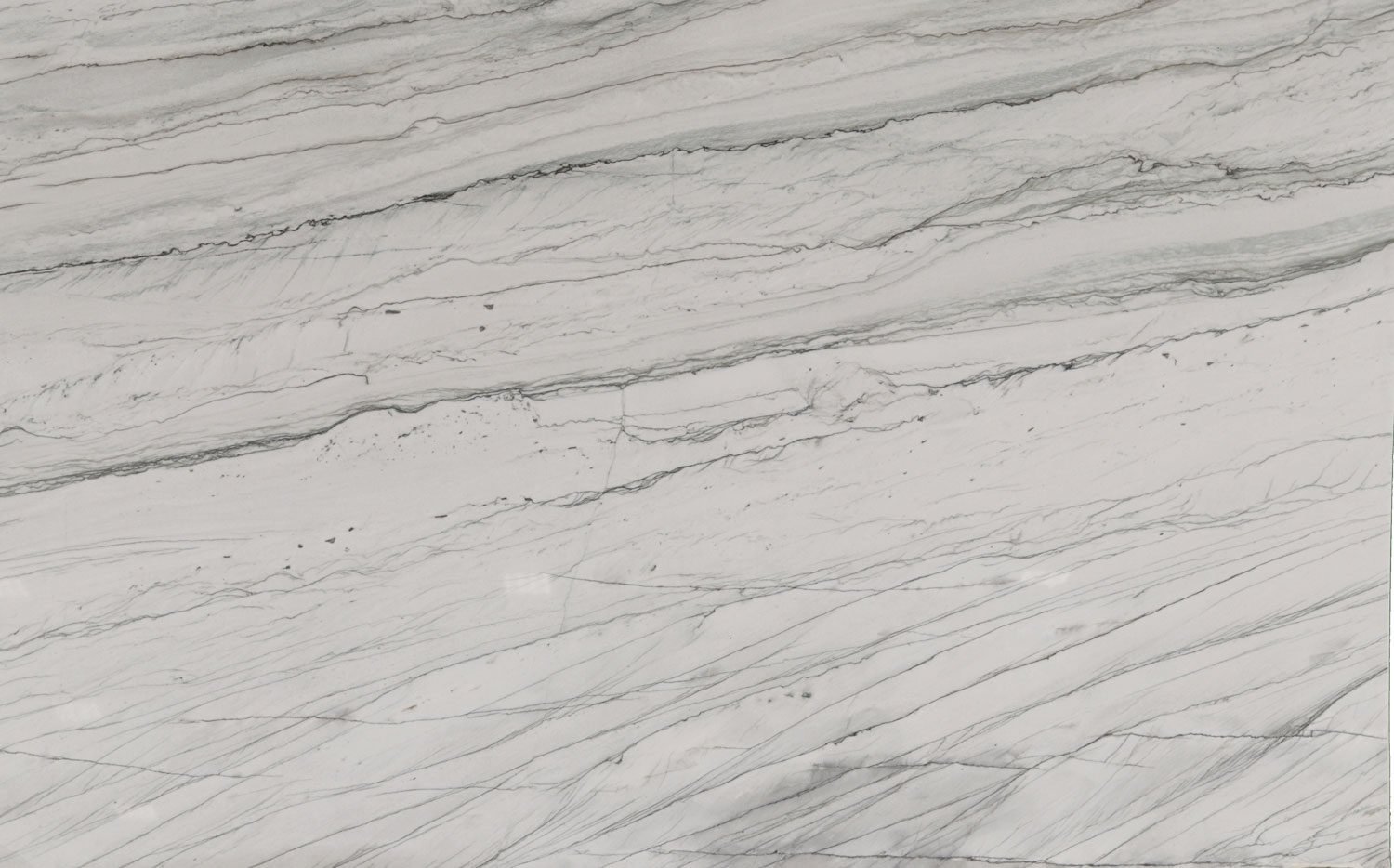 Infinity White quartzite countertops with a crisp white background and bold gray linear pattern, perfect for kitchen countertops by Granite Guy Inc.