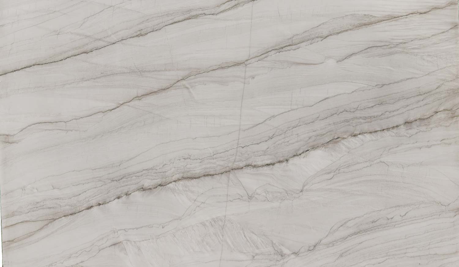 Mykonos quartzite countertops with soft white tones and elegant linear gray veining, perfect for kitchen countertops by Granite Guy Inc.
