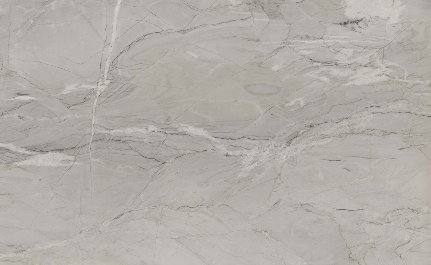 Nuage quartzite countertops with soft gray tones and natural patterns, ideal for kitchen countertops and luxury interiors by Granite Guy Inc.