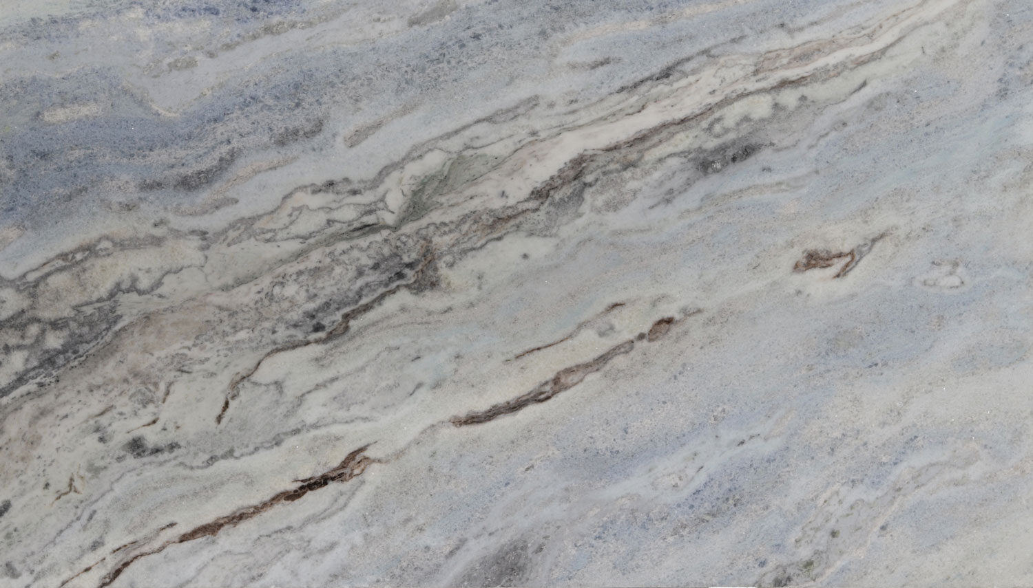 Panda Blue quartzite countertops with soft blue tones and flowing veins, perfect for kitchen countertops by Granite Guy Inc.