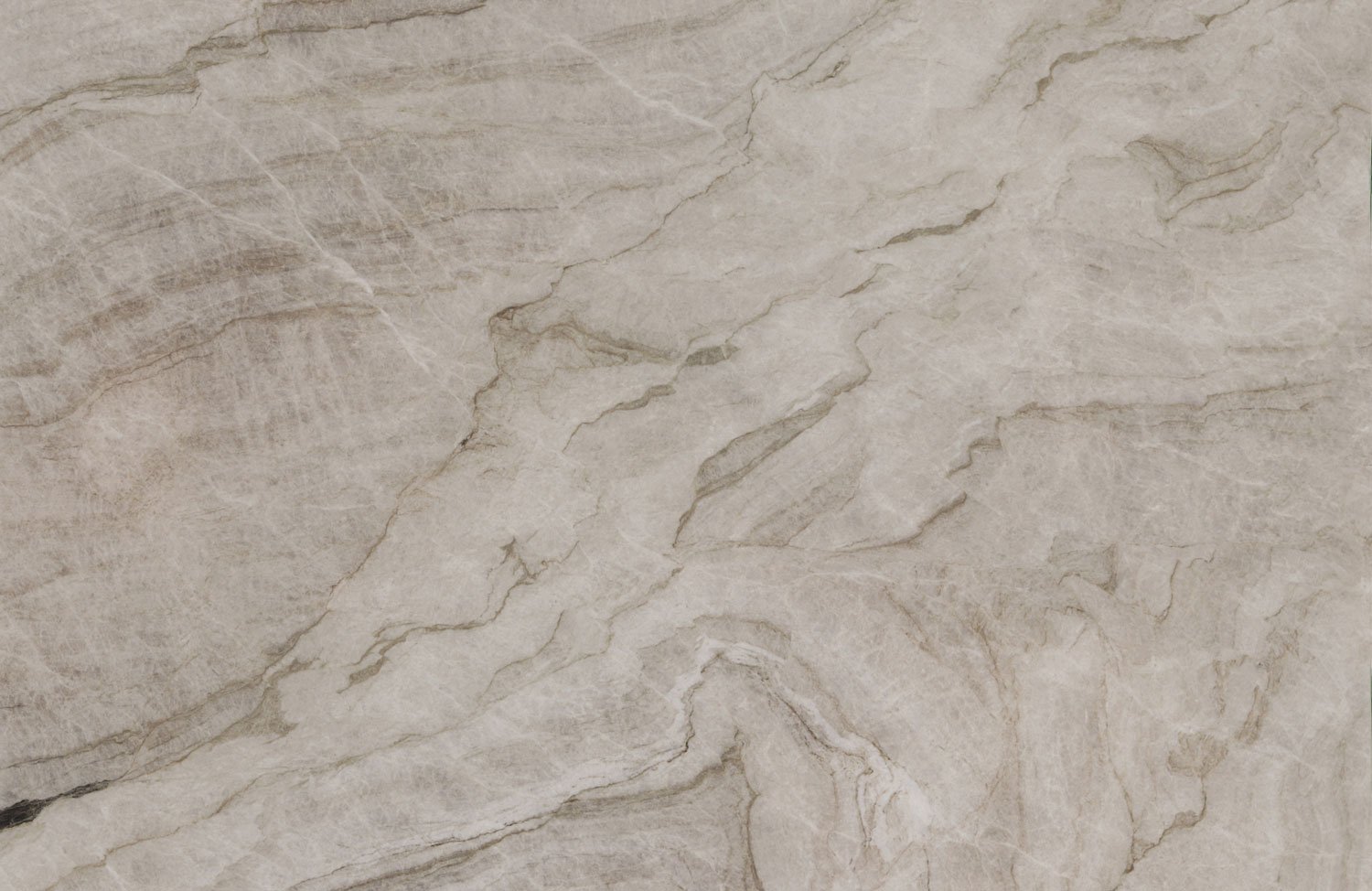 Taj Mahal quartzite countertops with flowing beige and gold veining, creating a sophisticated and organic look by Granite Guy Inc.
