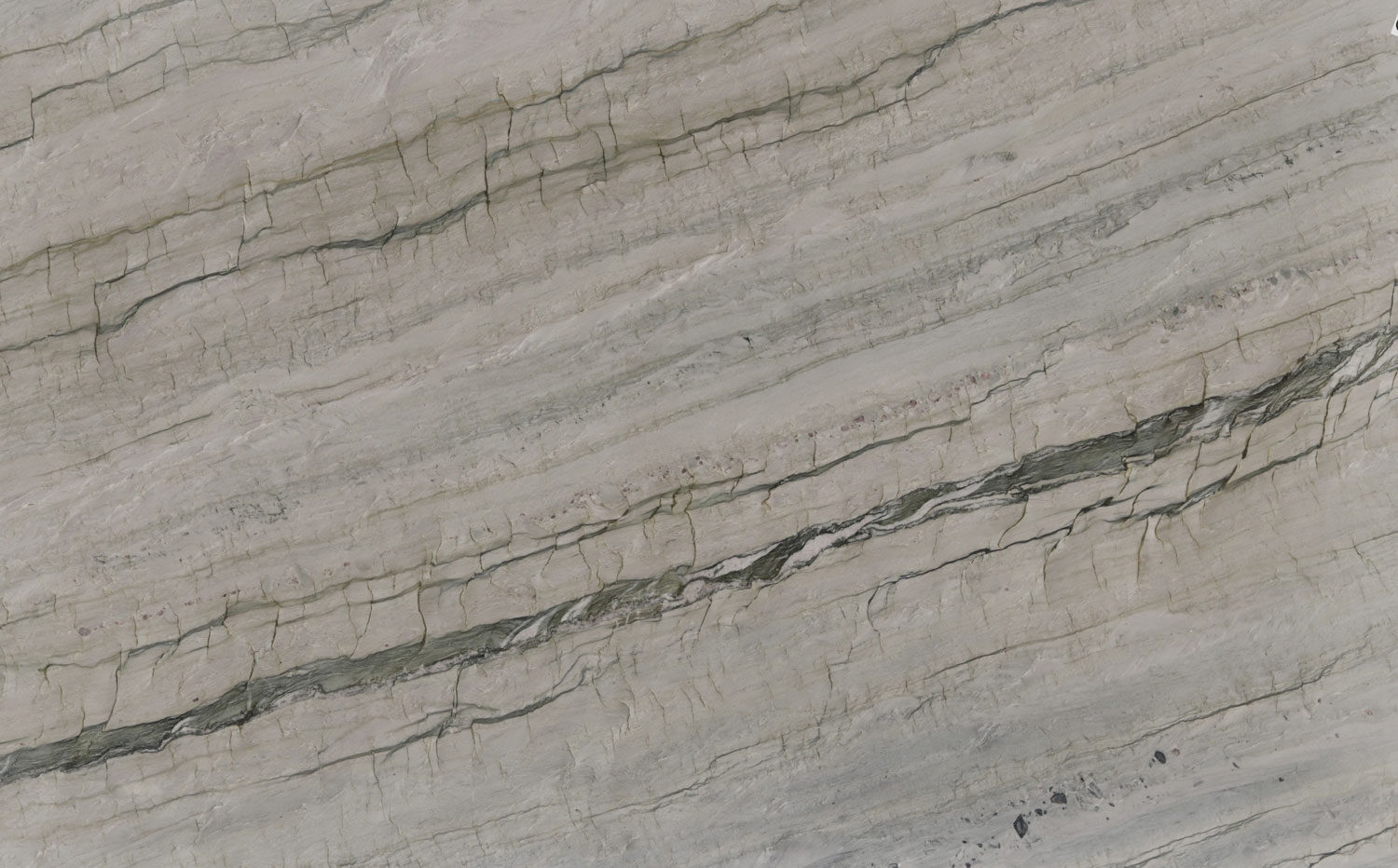 Zircon quartzite countertops with soft gray tones and striking dark veins, perfect for kitchen countertops by Granite Guy Inc.